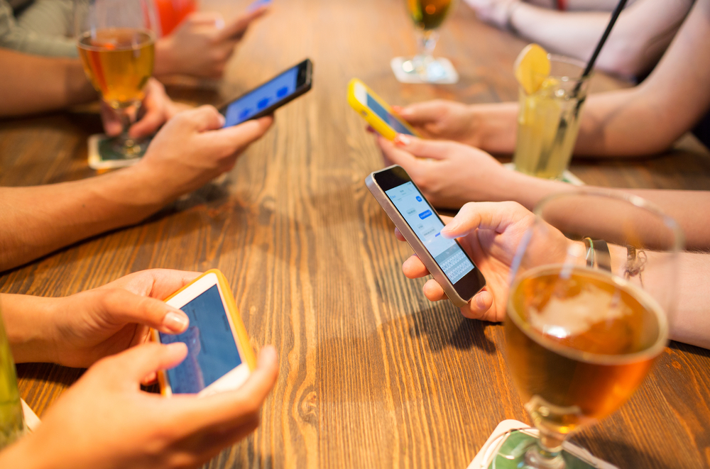 messaging apps at restaurant